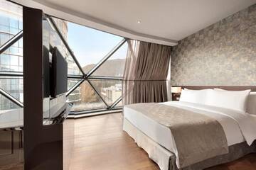Фото номера Президентский люкс Отель Wyndham Grand Tbilisi г. Тбилиси 5