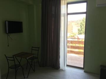 Фото номера Двухместный номер Делюкс с 1 кроватью и балконом Отель Avlabari Terrace Rooms г. Тбилиси 9