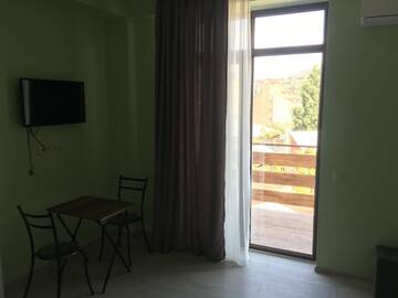 Фото номера Двухместный номер Делюкс с 1 кроватью и балконом Отель Avlabari Terrace Rooms г. Тбилиси 2
