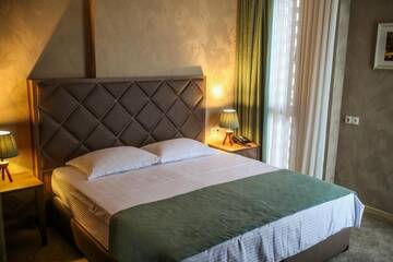 Фото номера Двухместный номер с 2 отдельными кроватями и балконом Отель Grand Hotel Mimino г. Тбилиси 21
