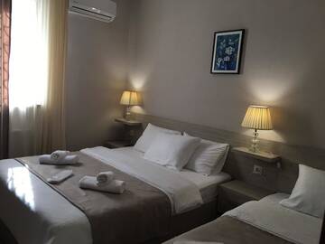 Фото номера Стандартный трехместный номер Отель Hotel Triston г. Тбилиси 9