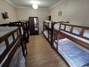 Фото номера Спальное место на двухъярусной кровати в общем номере для мужчин и женщин Хостелы Rose House г. Тбилиси 10