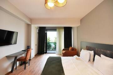 Фото номера Двухместный номер Делюкс с 1 кроватью и балконом Отель Jazz Hotel г. Тбилиси 14