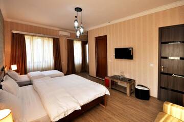 Фото номера Апартаменты с 1 спальней Отель BERIKA HOUSE г. Тбилиси 3