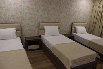 Фото номера Трехместный номер с ванной комнатой Отель Hotel Lile г. Тбилиси 2