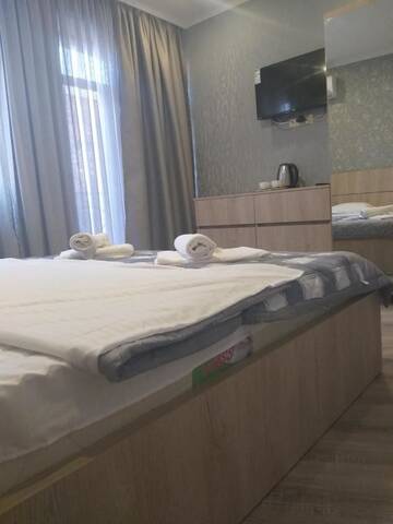 Фото номера Стандартный двухместный номер с 1 кроватью Отель Tbilisi Center Hotel г. Тбилиси 5