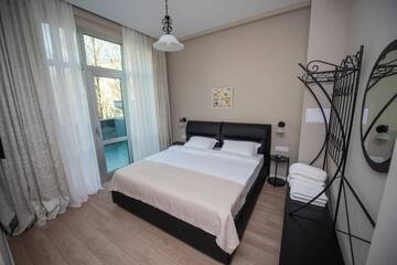Фото номера Улучшенный двухместный номер с 1 кроватью и террасой Отель BINA 21 Hotel г. Тбилиси 8