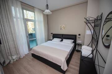 Фото номера Улучшенный двухместный номер с 1 кроватью и террасой Отель BINA 21 Hotel г. Тбилиси 3