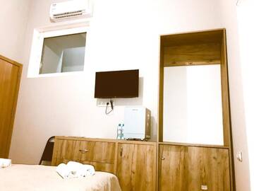 Фото номера Бюджетный двухместный номер с 1 кроватью Отель Liberty Square Apartment г. Тбилиси 5
