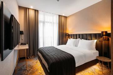 Фото номера Стандартный двухместный номер с 1 кроватью Отель Taberne Boutique Hotel Tbilisi г. Тбилиси 4