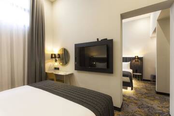 Фото номера Семейный номер Отель Taberne Boutique Hotel Tbilisi г. Тбилиси 2