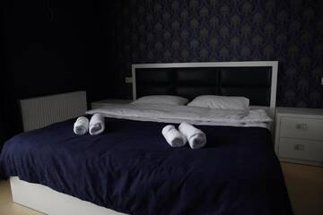 Фото номера Номер с кроватью размера «king-size» и видом на горы Отель Tbilisi Sea Hotel г. Тбилиси 3