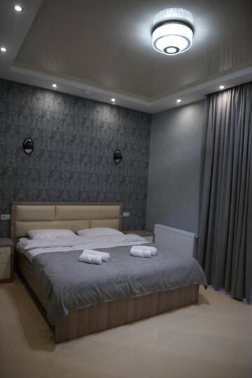 Фото номера Двухместный номер Делюкс с 1 кроватью Отель Tbilisi Sea Hotel г. Тбилиси 2