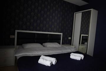 Фото номера Номер с кроватью размера «king-size» и видом на горы Отель Tbilisi Sea Hotel г. Тбилиси 5