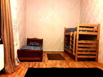 Фото номера Спальное место на двухъярусной кровати в общем номере для мужчин и женщин Хостелы Central House г. Тбилиси 13