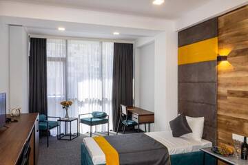 Фото номера Стандартный двухместный номер с 2 отдельными кроватями Отель BG Palace Hotel г. Тбилиси 2