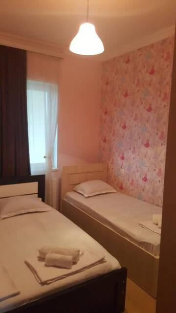 Фото номера Бюджетный трехместный номер Гостевой дом guesthouse new different г. Тбилиси 2