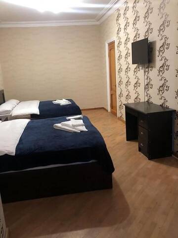 Фото номера Двухместный номер с 2 двуспальными кроватями Гостевой дом 4 SEASONS HOTEL г. Тбилиси 11