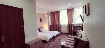 Фото номера Стандартный двухместный номер с 2 отдельными кроватями Отель Hotel DAKE Didube г. Тбилиси 2