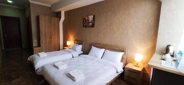 Фото номера Трехместный номер Отель Hotel DAKE Didube г. Тбилиси 6