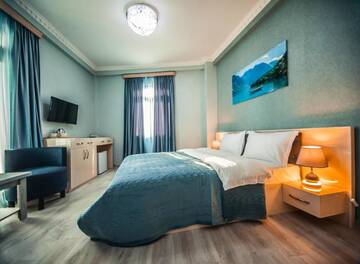 Фото номера Номер Делюкс с кроватью размера «king-size» Отель Musmore Hotel г. Тбилиси 3