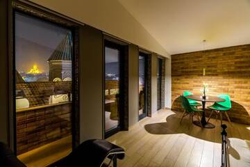 Фото номера Апартаменты в пентхаусе с балконом, панорамный вид Апарт-отели Boutique Apart Hotel Upe г. Тбилиси 3
